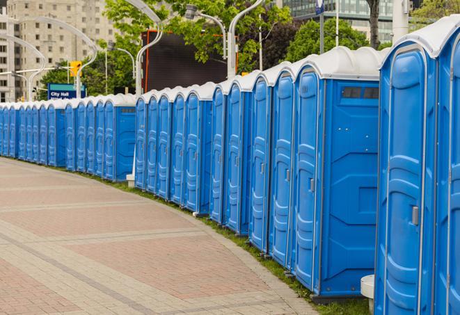 a row of portable restrooms at a trade show, catering to visitors with a professional and comfortable experience in Bedford, MA